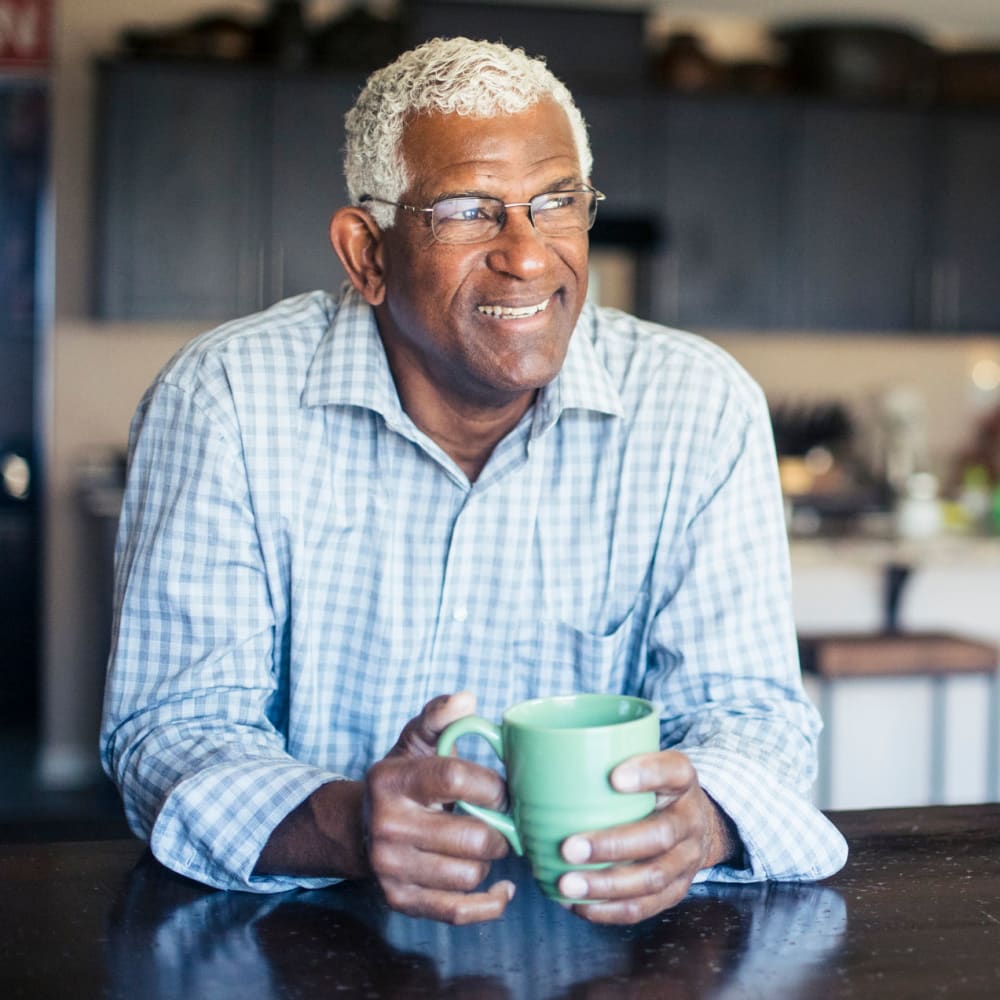 A resident drinking coffee in his apartment at Lakeview Terrace of Boulder City in Boulder City, Nevada