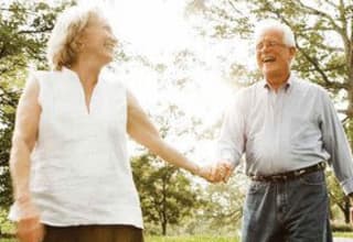 Senior living residents take a walk in nature in Louisiana