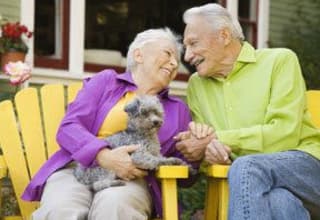 Louisiana seniors sitting with their pet