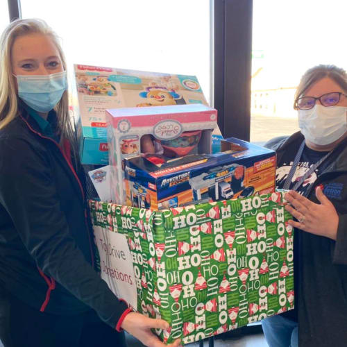 Caregivers taking toy drive donations at Homestead House in Beatrice, Nebraska