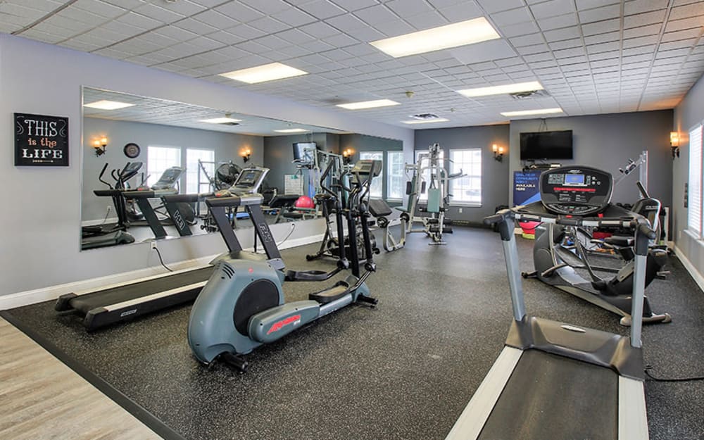 Well-equipped fitness center with cardio equipment at Clemmons Station Apartment Homes in Clemmons, North Carolina