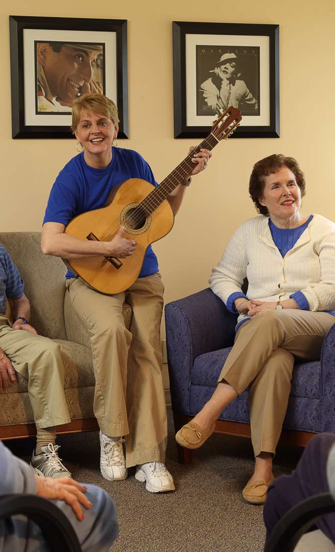 Residents playing guitars at O'Fallon in O'Fallon, Missouri