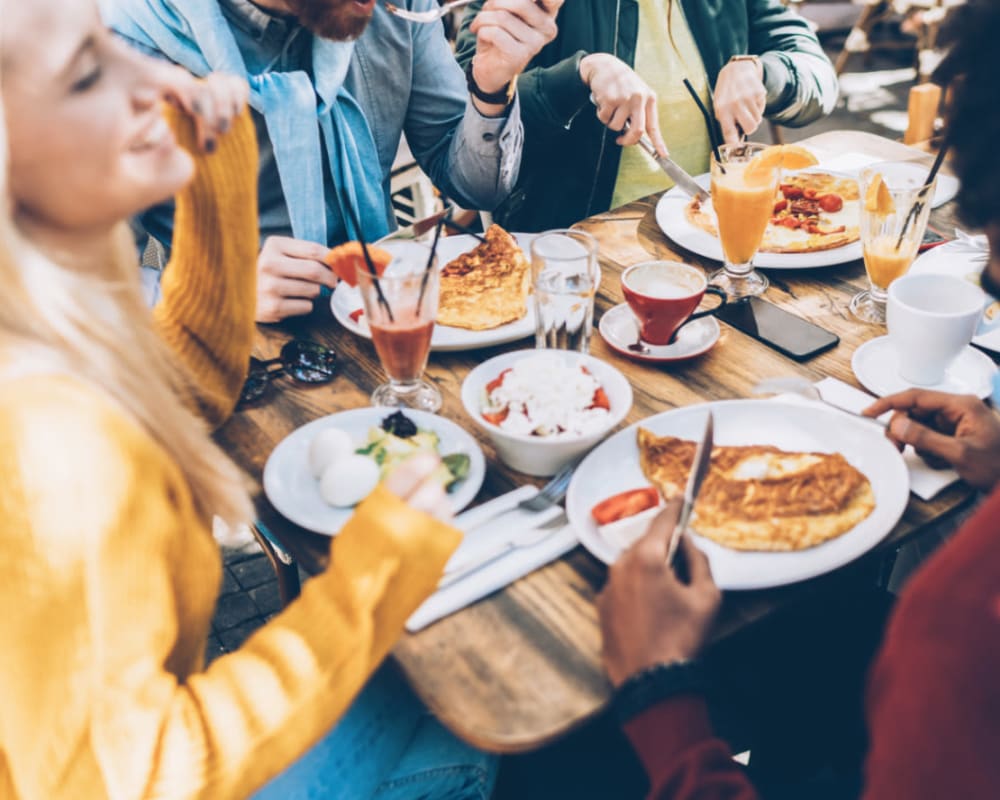 Residents enjoying a meal near Harborview in Oceanside, California