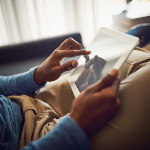 A resident working on his iPad at Miramar Milcon in San Diego, California