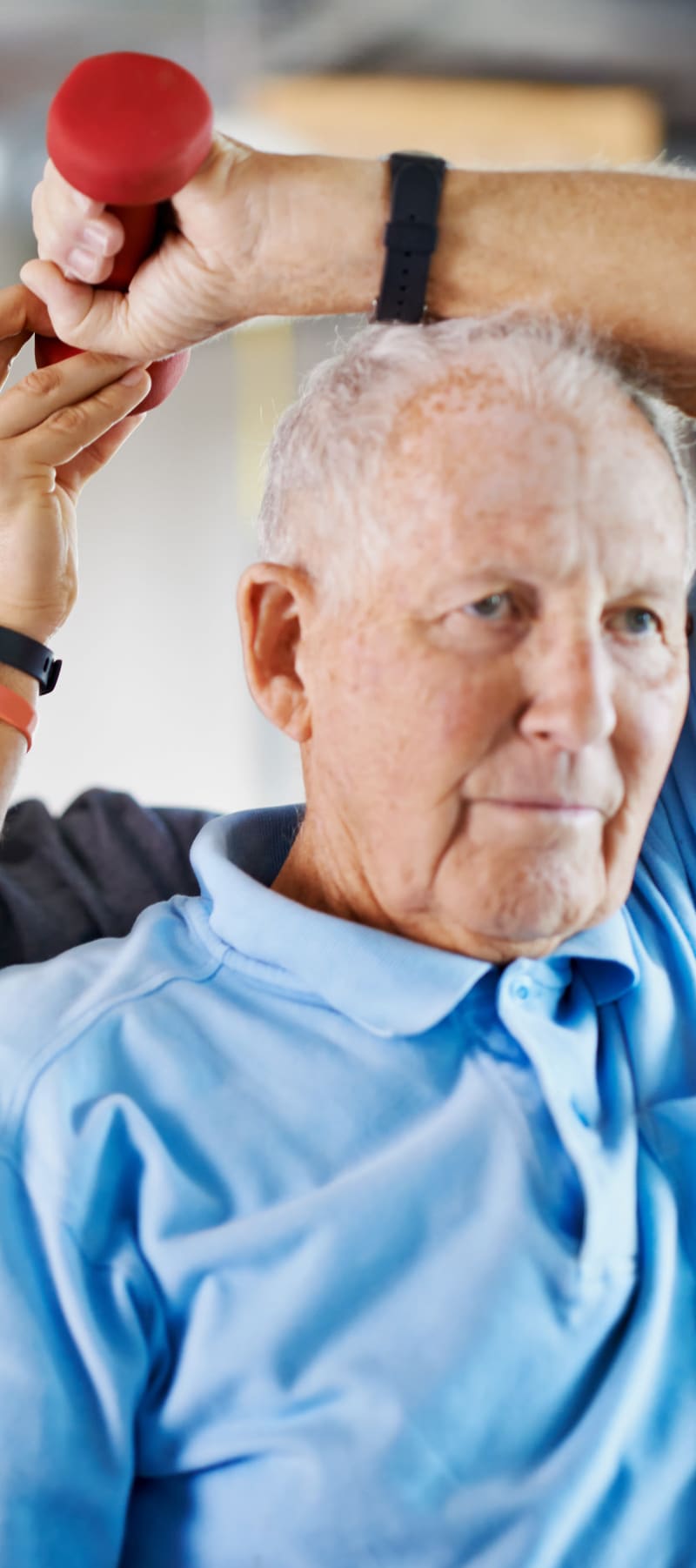 Resident lifting weights at Montello Care Center in Montello, Wisconsin