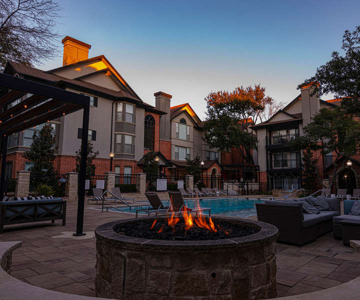 Community fire place at Carrara At Cole in Dallas, Texas