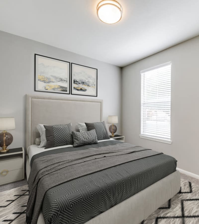 Cozy model bedroom at Parkside Towns in Richardson, Texas