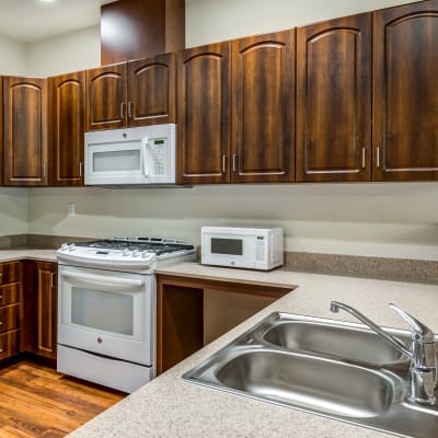 Brown cabinets in a kitchen at Seaside Village in Oceanside, California