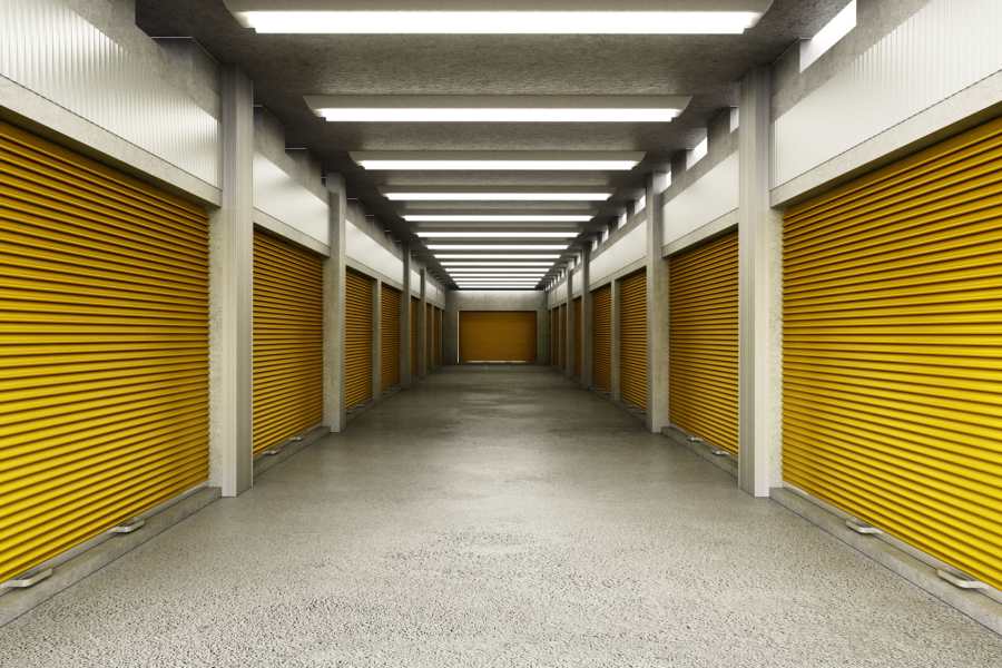 Yellow storage unit doors in a hallway at Centennial Storage in Bonney Lake, Washington