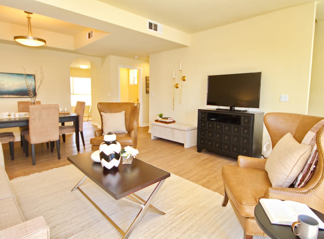 View of dining area from living room of model home at IMT Townhomes at Magnolia Woods in Sherman Oaks, CA