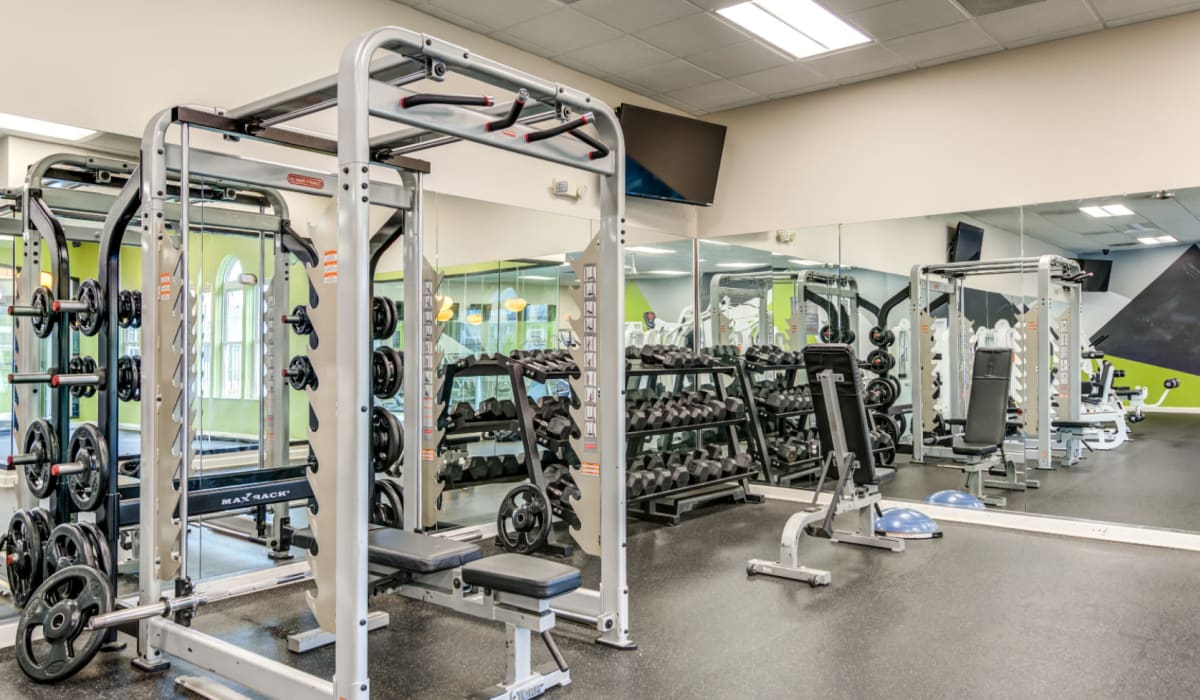 Fitness center with exercise equipment at The Seasons Apartments in Laurel, Maryland