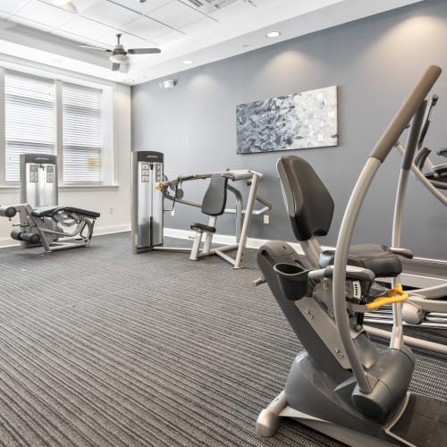 Cardio machines and weights in the high-tech fitness center at Ethan Pointe Apartments in Rochester, New York