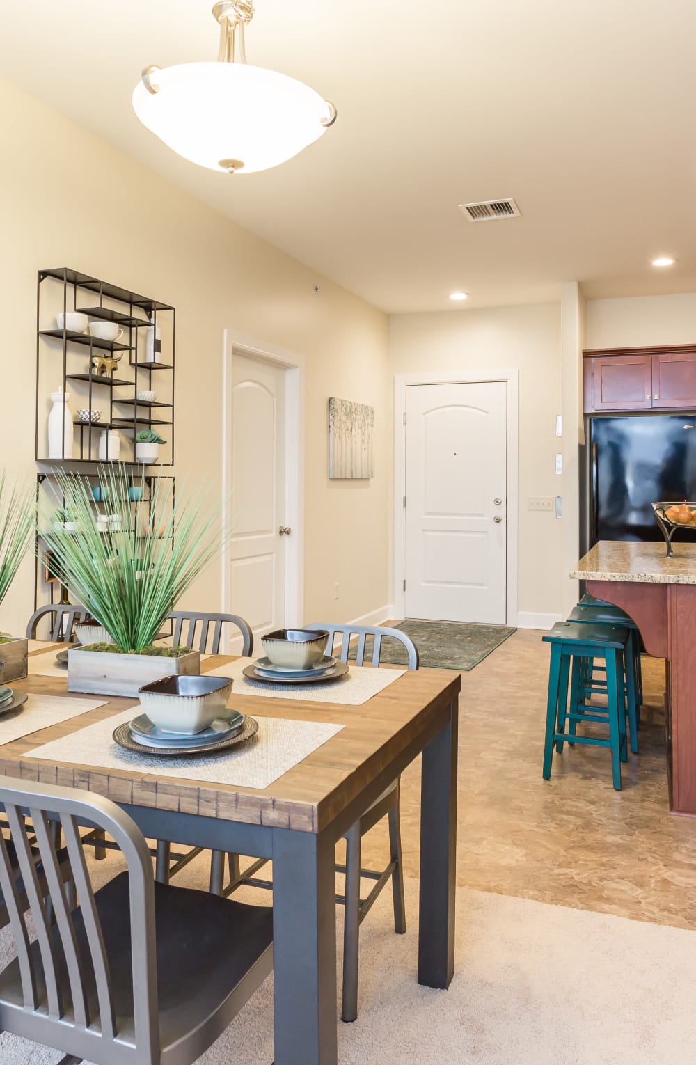 Dining area of a model home at Gateway Landing on the Canal in Rochester, New York