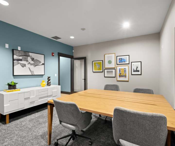 Business center with meeting table at Yauger Park Villas in Olympia, Washington