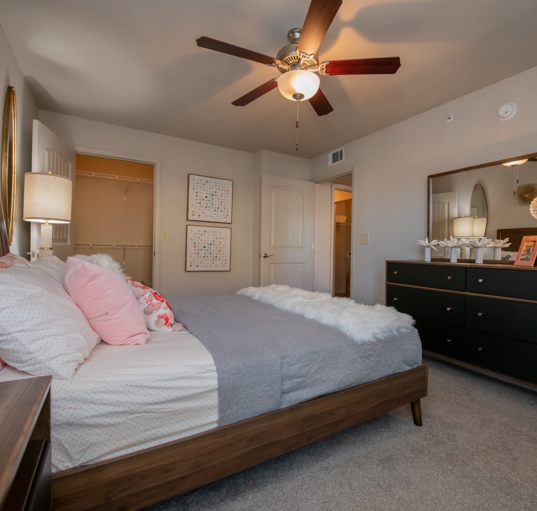 Bright and modern bedroom Portico at Friars Creek Apartments living room in Temple, Texas