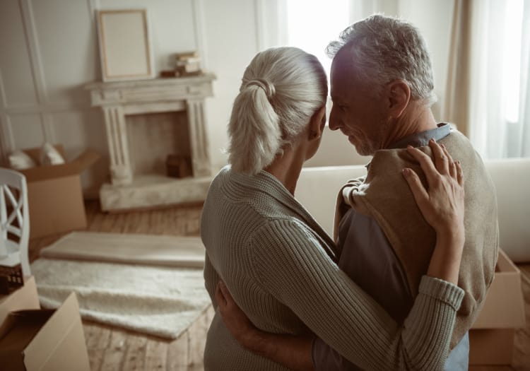 Senior couple hugging at MBK Senior Living in Irvine, California