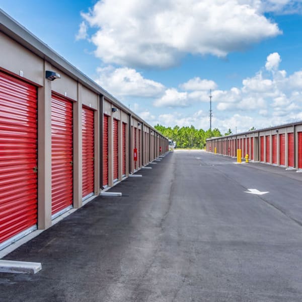 Drive up storage units with bright doors at StorQuest Self Storage in Renton, Washington