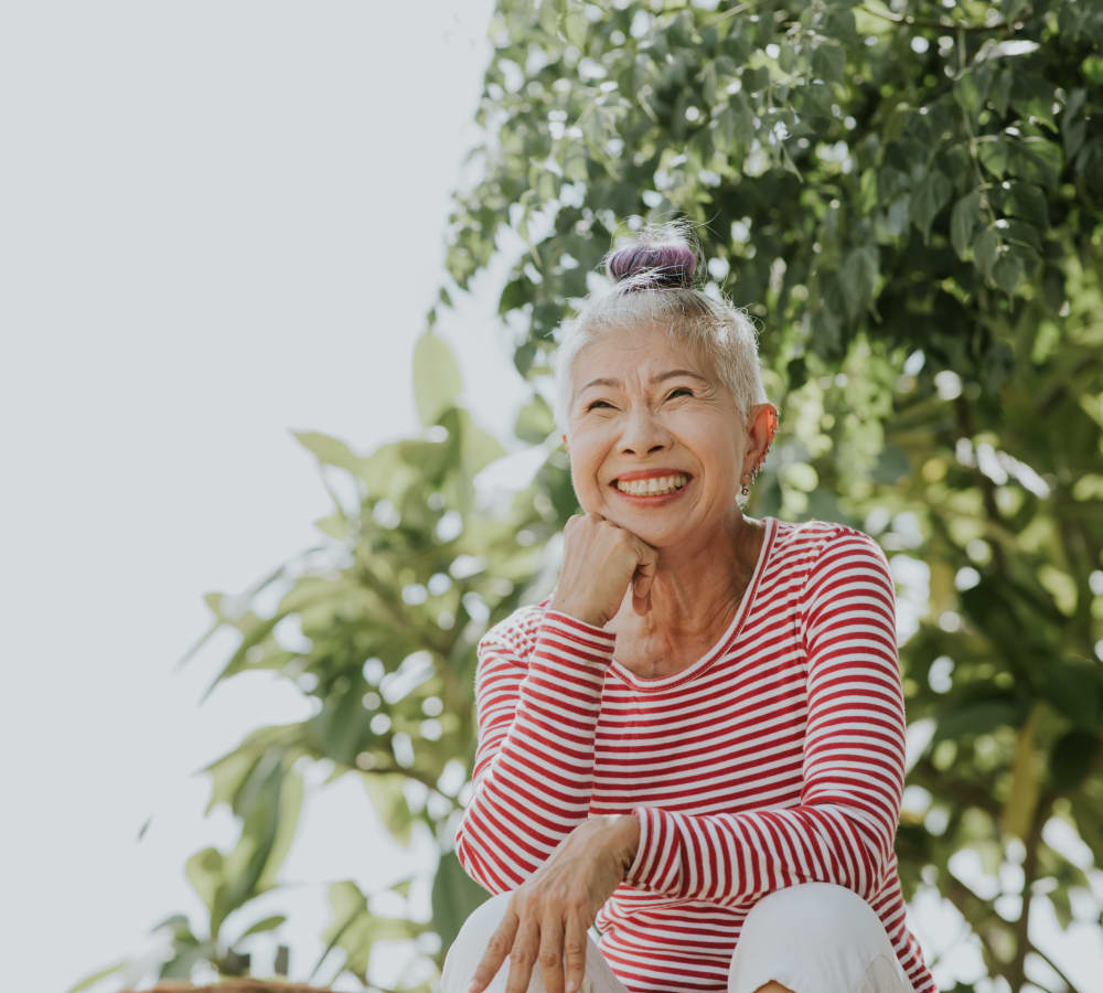 A resident enjoying the outdoors near Bridgeport Place Assisted Living in University Place, Washington.