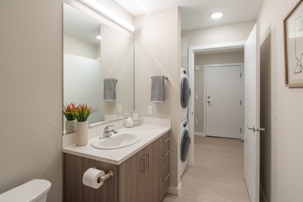 Bathrooms with drawer storage and in unit washer and dryer at Division 30 in Portland, Oregon