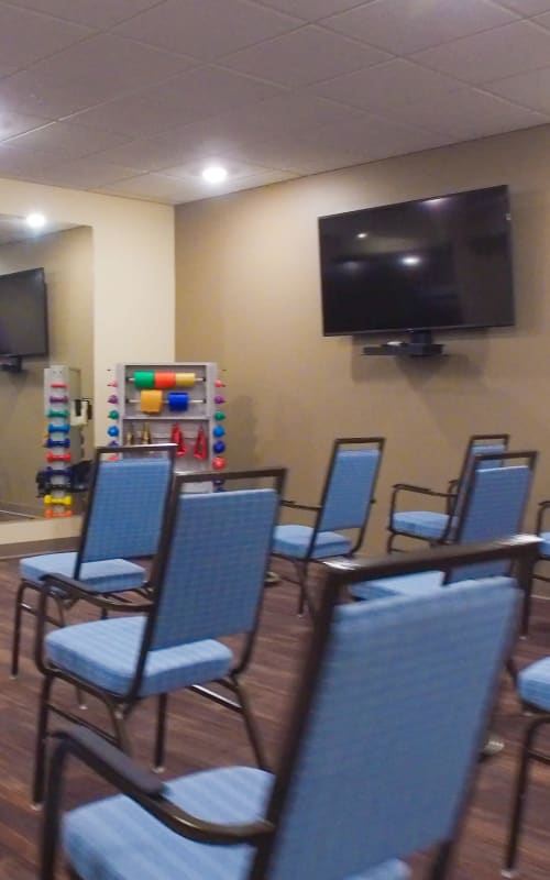 Recreation room with plenty of seating and large television at The Pillars of Mankato in Mankato, Minnesota