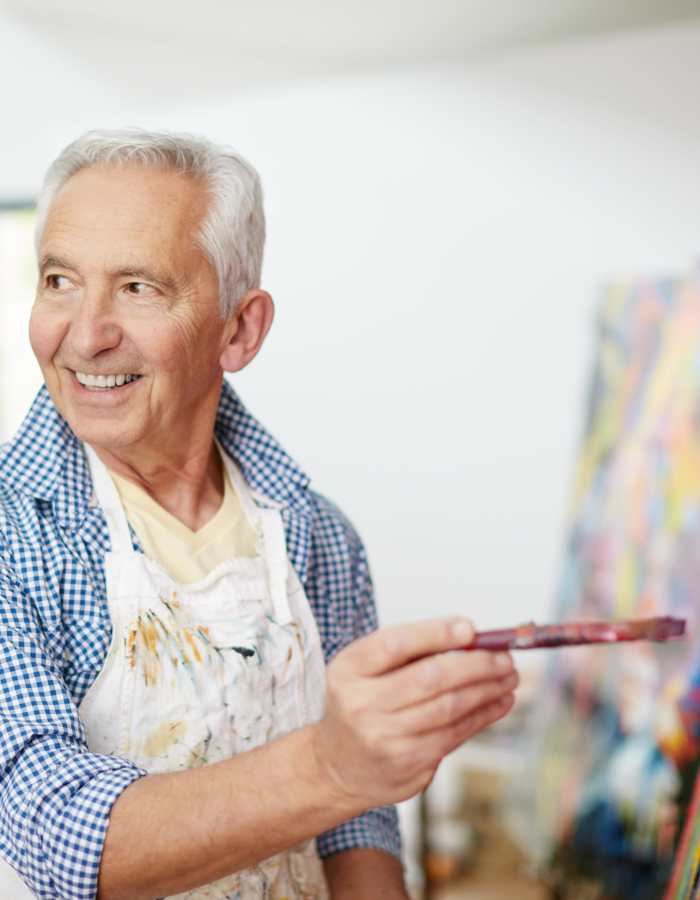 resident painting at Clearwater Living in Newport Beach, California