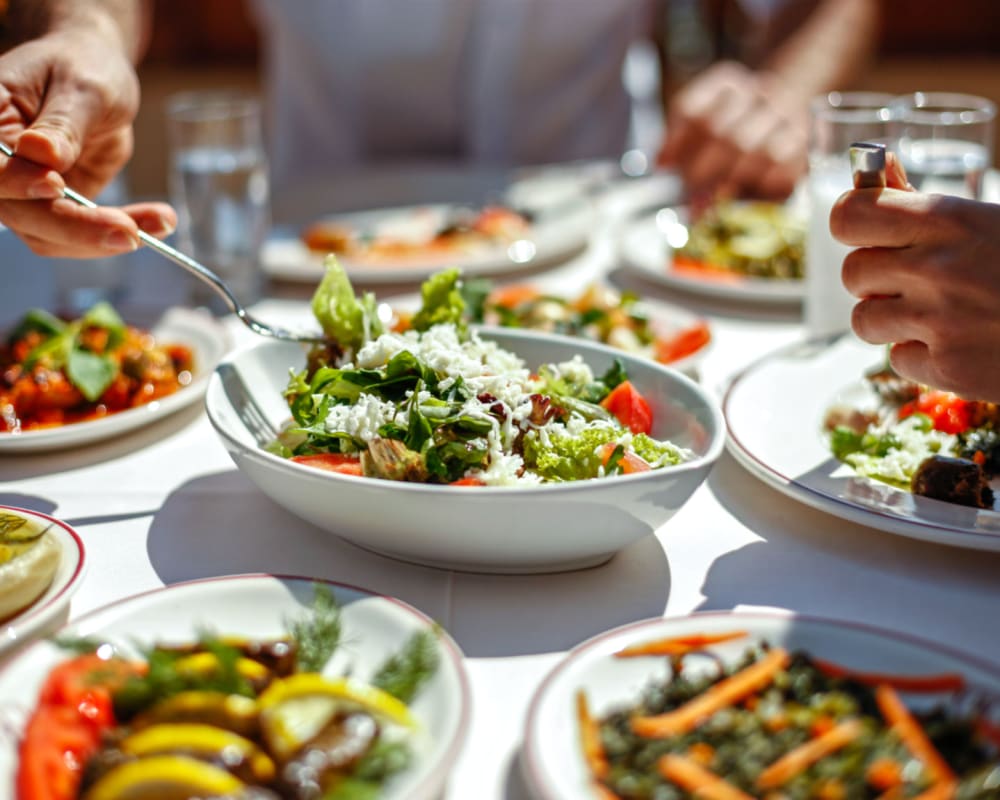 Residents eating a meal near San Mateo Point in San Clemente, California