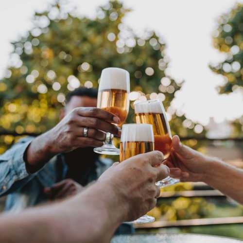 Resident friends enjoying drinks outside on a beautiful day at The Villas at Keystone Canyon in Reno, Nevada