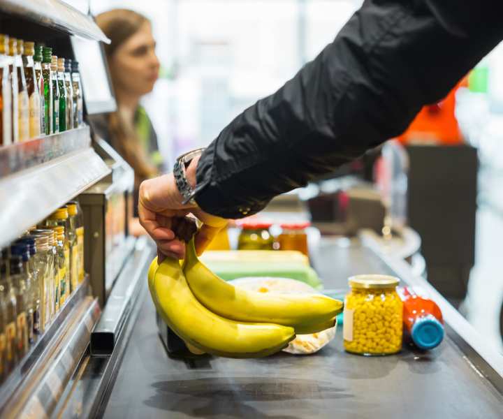 Resident shopping groceries from supermarket near The Falgrove Apartments in Omaha, Nebraska