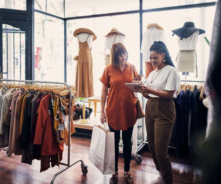 Residents shopping near El Jardin Apartments in Hollywood, Florida 