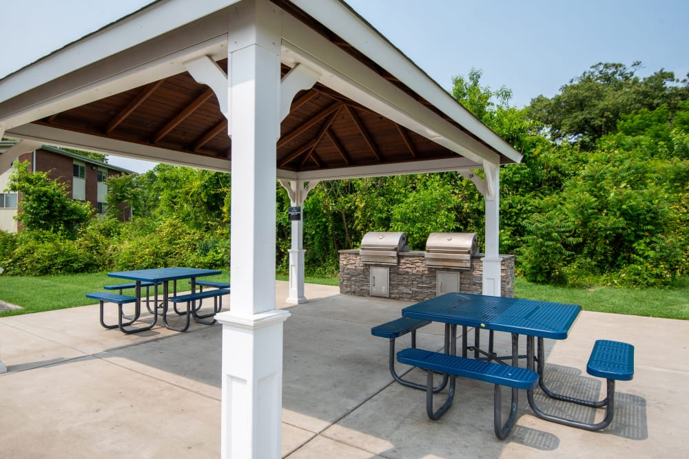 Pavilion with 2 picnic tables and 2 grilling stations at Glen Ridge Apartment Homes in Glen Burnie, Maryland