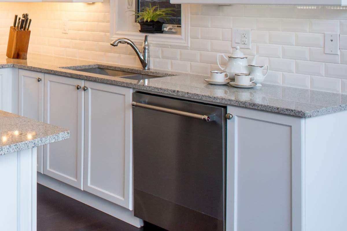 Kitchen with a dishwasher at Falcon Crest Apartments in Louisville, Kentucky