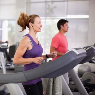 Residents doing cardio in the fitness center at Terra Apartments, Austin, Texas
