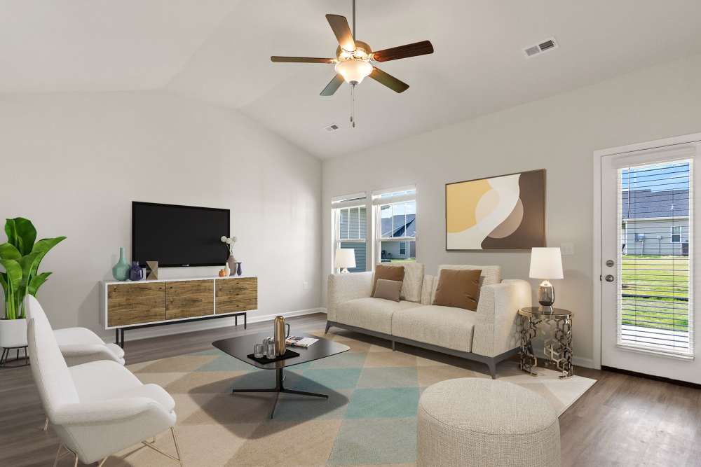 Modern living room at Crystal Lake & Kingsley Apartments and Townhomes in Fayetteville, North Carolina