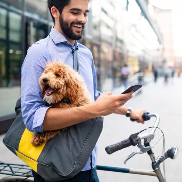 Resident biking with his dog near Marquam Heights in Portland, Oregon