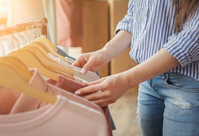 Resident out clothes shopping near 505 West Apartment Homes in Tempe, Arizona