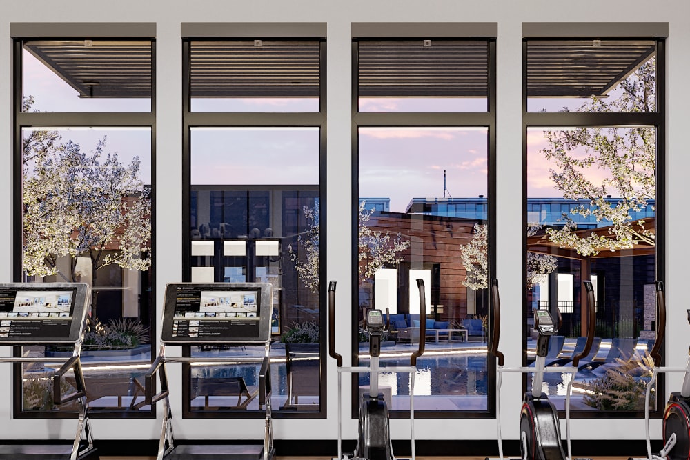 Cardio space with amazing views at Solana Stapleton Apartments in Denver, Colorado