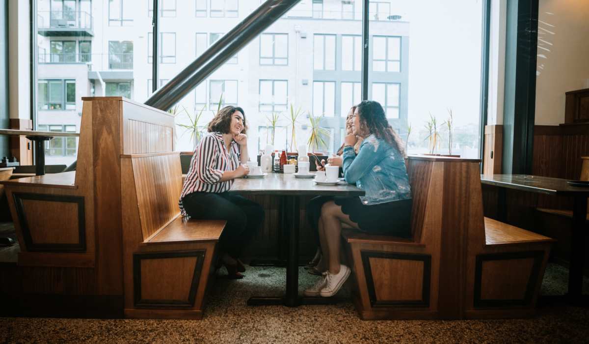 Residents in their favorite restaurant near Whispering Pines Ranch in The Woodlands, Texas