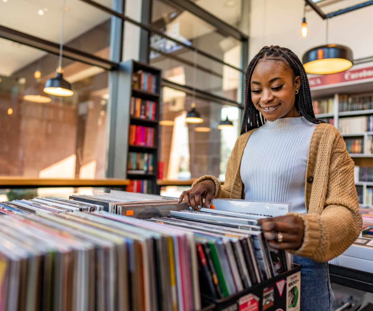 Woman buying books from a book store near Mazza Grandmarc in College Park, Maryland