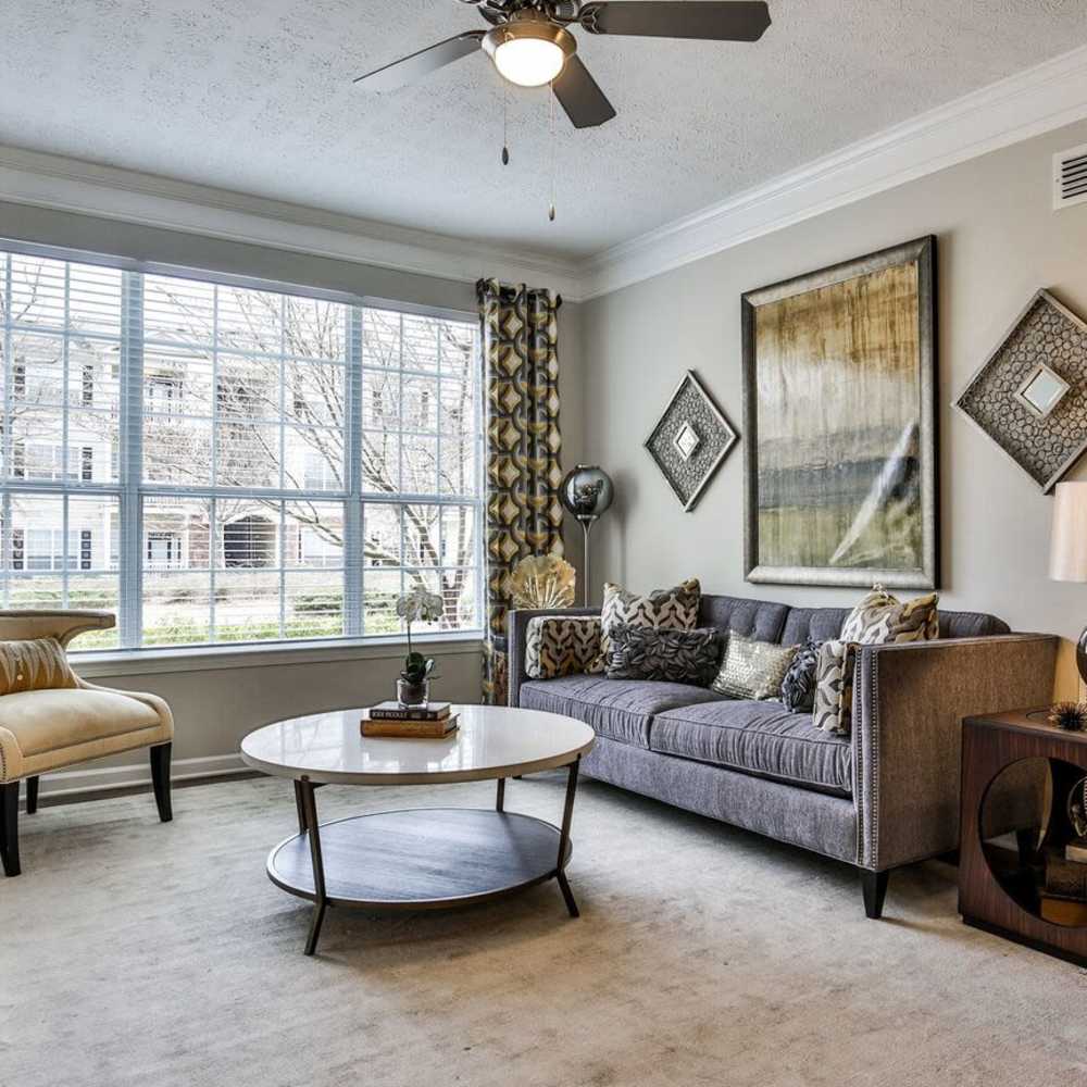 Living space with couch and chairs at Avonlea Highlands in Cartersville, Georgia