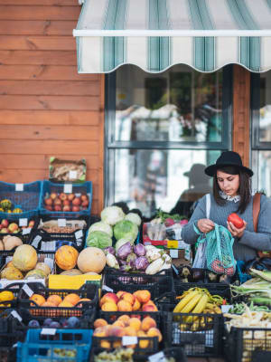 A women enjoying shopping at the farmer's market near Radiate in Redmond, Washington