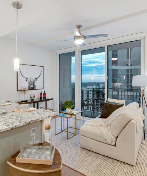 Living room with balcony access at Vireo | Apartments in Atlanta, Georgia