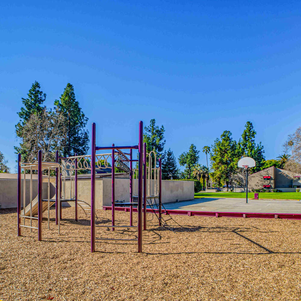 Children's playground by the basketball court at Kings Villages in Pasadena, California