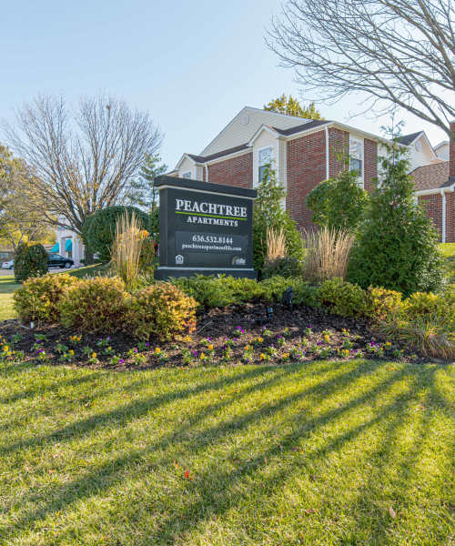 Apartment signage board at Peachtree Apartments in Chesterfield, Missouri
