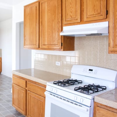 White cabinets in a kitchen at Chollas Heights Historical in San Diego, California