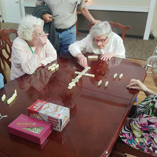 A resident with art project at Canoe Brook Assisted Living in Broken Arrow, Oklahoma