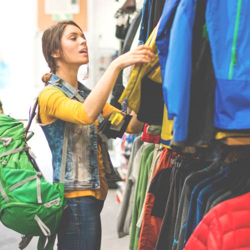 Residents shopping a sidewalk sale at Titan Court in Eugene, Oregon