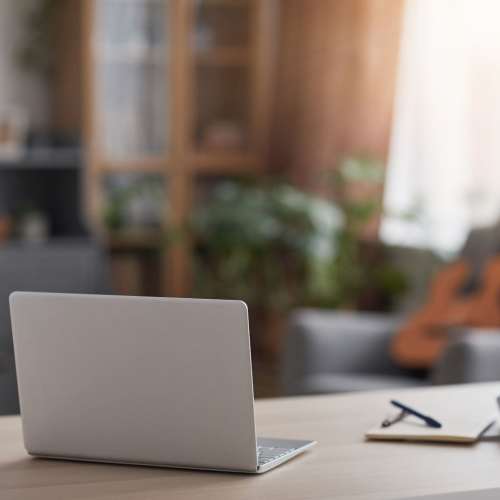 Laptop on a desk with decoration at North Avenue Gateway I in Baltimore, Maryland