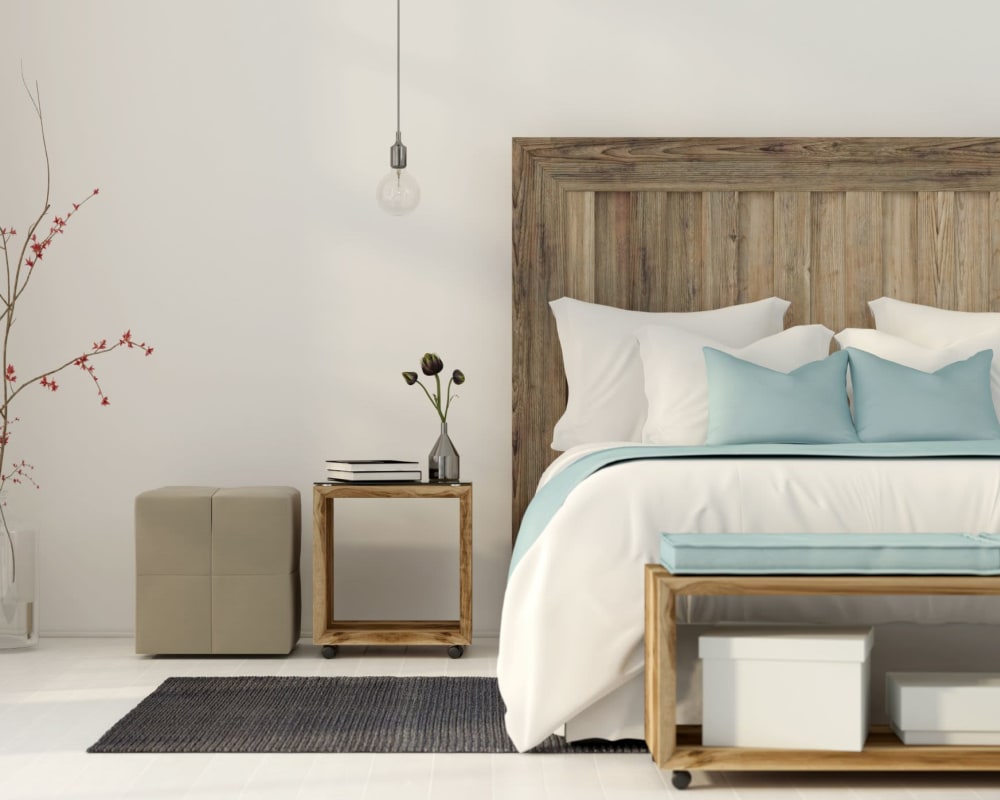 Model bedroom decorated very nicely with a light color tone at Eagle Rock Apartments at Maplewood in Maplewood, New Jersey