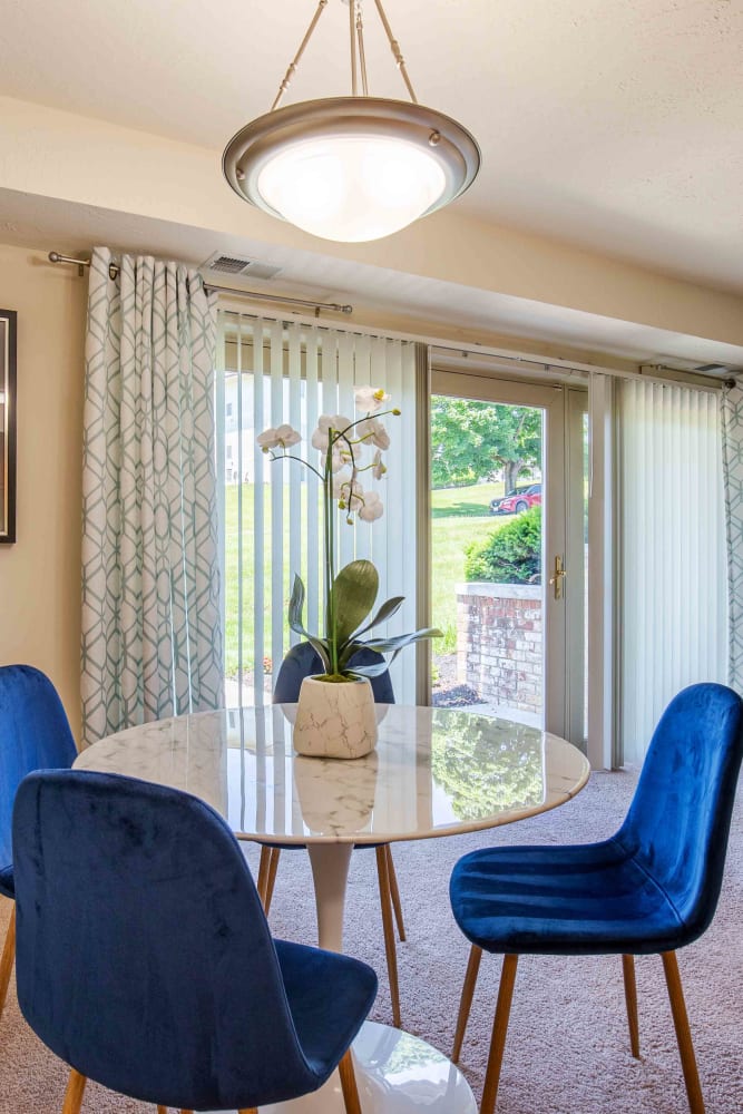 Dining room with sliding door out to patio at Morningside Apartments & Townhomes in Owings Mills, Maryland