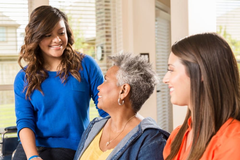 Family members visit resident at The Preserve of Roseville in Roseville, Minnesota.